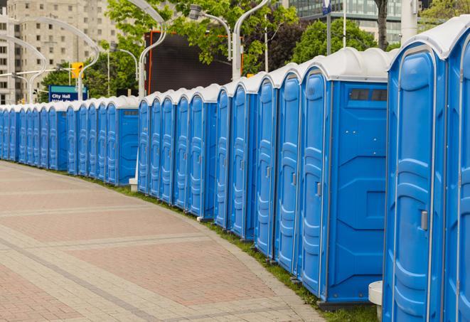 portable restrooms with sink and hand sanitizer stations, available at a festival in Draper, UT